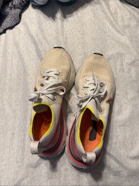 Nike Beige Knit Running Shoes with Neon Pink and Yellow Accents
